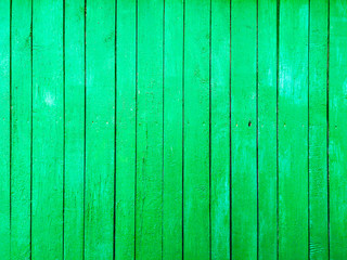 Wooden boards painted on the wall in green