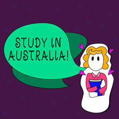 Text sign showing Study In Australia. Conceptual photo going into foreign country order complete your studies Girl Holding Book with Small Hearts Around her and Two Color Speech Bubble.