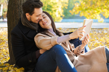 Cheerful young couple spending fun time