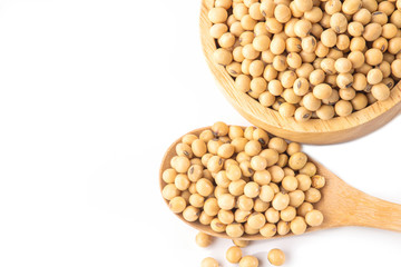soy beans in wooden bowl and spoon isolated on white background isolated on white background