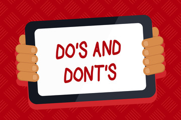 Conceptual hand writing showing Do S And Dont S. Business photo text Rules or customs concerning some activity or actions Color Tablet Smartphone with Screen Handheld Back of Gadget.