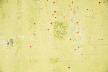 Abstract colorful wall texture and background for your design. Close-up iron surface with old yellow paint