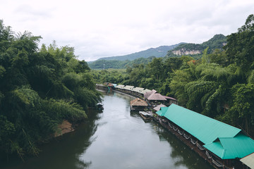 Many wooden house floating on the river
