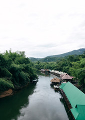 Fototapeta premium Many wooden house floating on the river