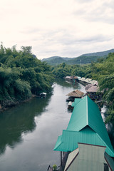 Naklejka premium Many wooden house floating on the river