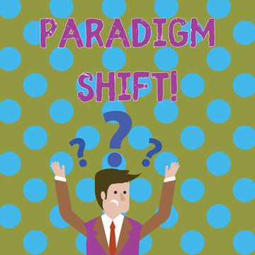 Handwriting text writing Paradigm Shift. Conceptual photo fundamental change in approach or underlying assumptions Confused Businessman Raising Both Arms with Question Marks Above his Head