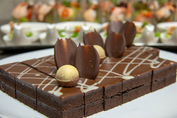  Delicious chocolate cake on white plate.