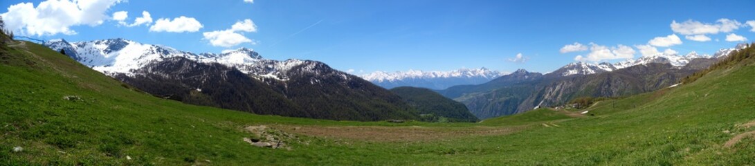 Fototapeta premium The mountains of the Italian Alps, in Val d'aosta, near the village of Chamois, Italy - June 2019.