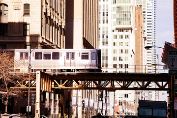 Metro passing on the bridge in Chicago city