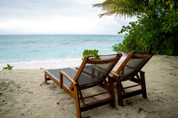 table and chairs on the beach