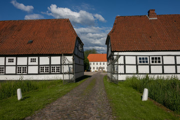 Fototapeta na wymiar manor estate Wulfshagen with timbered houses