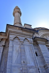 Looking up at minaret at Nuruosmaniye Mosque in Istanbul, Turkey