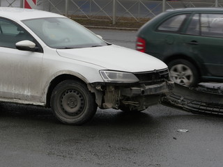 Fototapeta na wymiar St. Petersburg, Russia April 3, 2019 torn bumper accident on the road