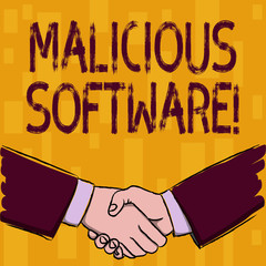 Writing note showing Malicious Software. Business concept for the software that brings harm to a computer system Businessmen Shaking Hands Form of Greeting and Agreement