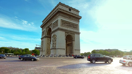 Paris, France - circa May, 2017: Arc de Triomphe viewed up the Champs Elysees with traffic jum in...