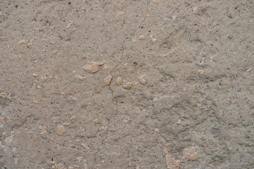 The texture of the cracks on the concrete wall