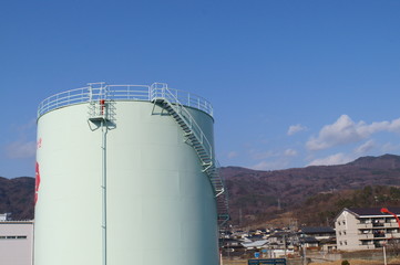 Fototapeta premium Chemical plant gas petroleum tank