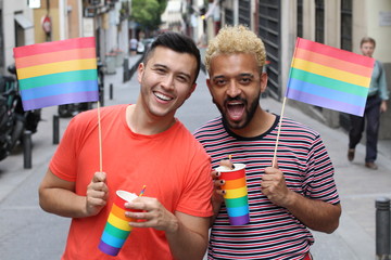 Two gay men partying outdoors