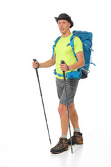 Young male tourist with nordic walking sticks and hiking backpack. - 274095595