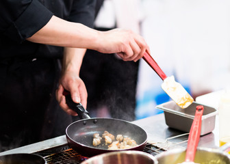 Chef preparing food in the kitchen, chef cooking