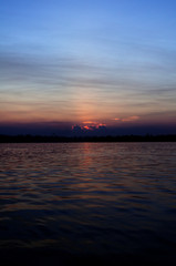 sunset clouds sun sky horizon silhouette 