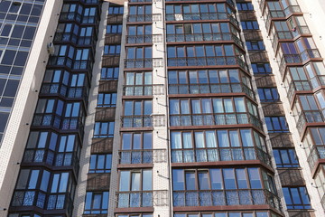 Fototapeta premium Modern condominium building real etate in city with blue sky