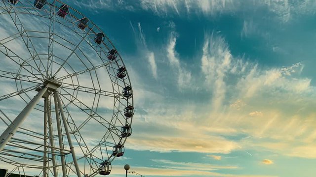Ferris wheel at sunset. Time lapse