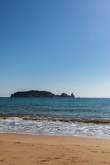 Fototapeta na wymiar Island view from the beach on sunny day - Medes Islands