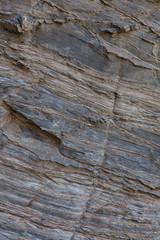 Textura de pedra natural. Superfície texturizada de rocha natural, onde se podem ver as linhas desenhadas na rocha ao longo do tempo. Pode ser usada como fundo.