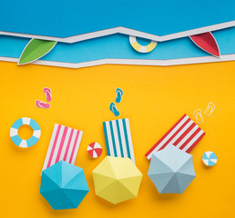 Summerr beach accessories placed on the sandy beach