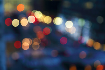 Blurry background image of defocused colorful abstract city street lights at night