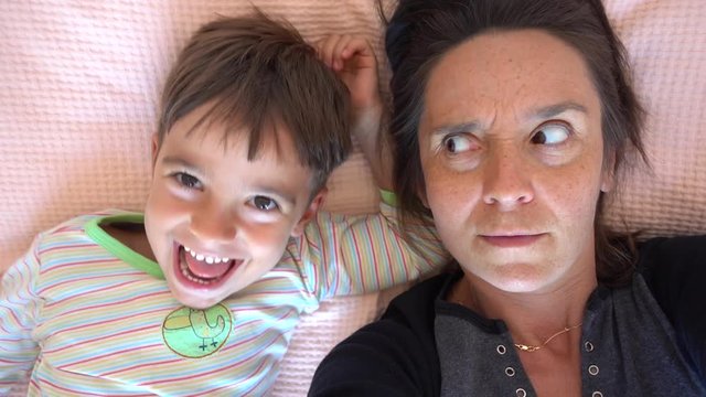 4K Selfie Yelling child running wild and and hopeless mother