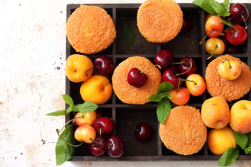 Homemade muffins with fruits and berries