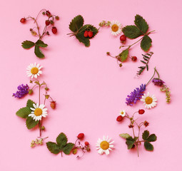 frame with flowers and strawberries