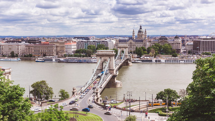 Fototapeta na wymiar Chain bridge on Danube river in Budapest city. Hungary. Urban landscape panorama with old buildings