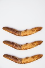Balkan baguettes on white background.
