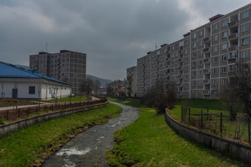 Block of flats in Kraslice town in soon spring cloudy day