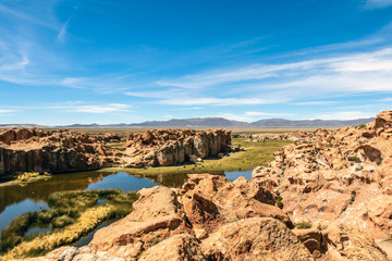 Fototapeta na wymiar View of the Laguna Negra, Black lagoon Lake wedged between rock formations in Altiplano, Bolivia