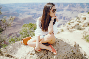 Fototapeta na wymiar girl exploring the grand canyon in Arizona during the summer