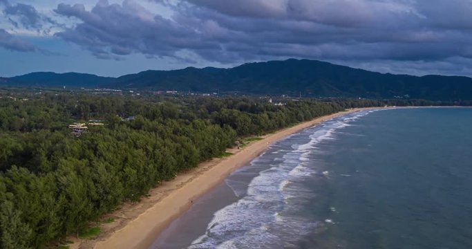 Aerial hyperlapse tracking over the sea and Layan Beach in Phuket during beautiful summer sunny day, Thailand