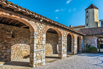 The corridor in the inner yard of Saint-Jean de Sorde Medieval Abbey. UNESCO world heritage site in...