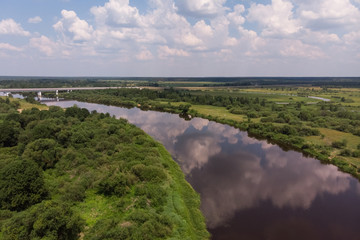 Fototapeta na wymiar Berezina river and bridge over the river from a bird's eye view