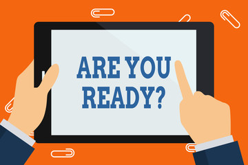 Word writing text Are You Ready Question. Business photo showcasing used telling someone start something when feel prepared Hand Holding Pointing Touching Blank Rectangular Color Tablet White Screen