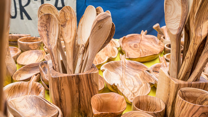 Retro wooden utensils for cooks. spoons, mallets, forks and cutlery handmade in handcrafted wood