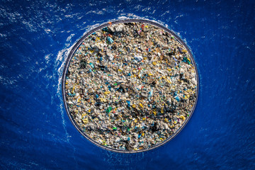 Concept cleaning ocean water from debris and plastic. Removing contaminants using ship and grid © Parilov