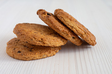 Close-up of cookies on white wooden background in horizontal