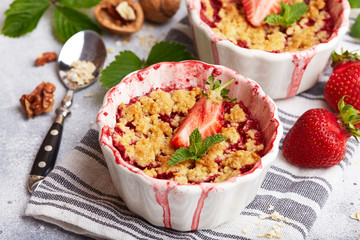 Crumble pie with strawberries. Delicious portion sweet dessert