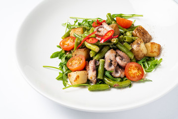 salad with baby octopus and vegetables