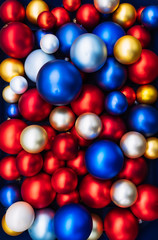 Heap of multiple various colorful christmas balls. Close up
