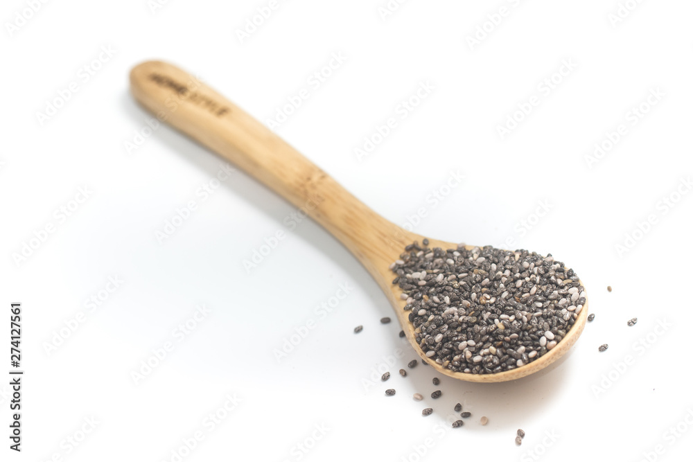 Wall mural Chia seeds in a wooden spoon